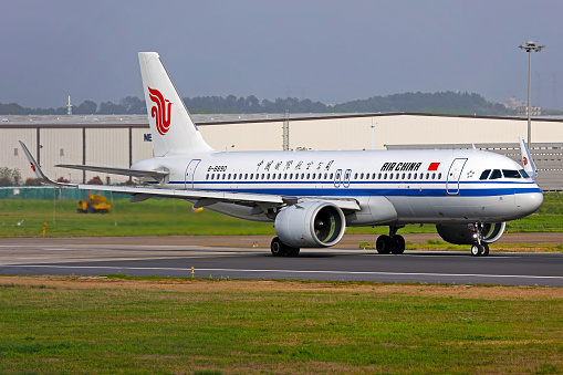 Amsterdam, Netherlands - April 12, 2015: China Eastern cargo plane at airport. Air freight and shipping. Aviation and aircraft. Transport industry. Global international transportation. Fly and flying.