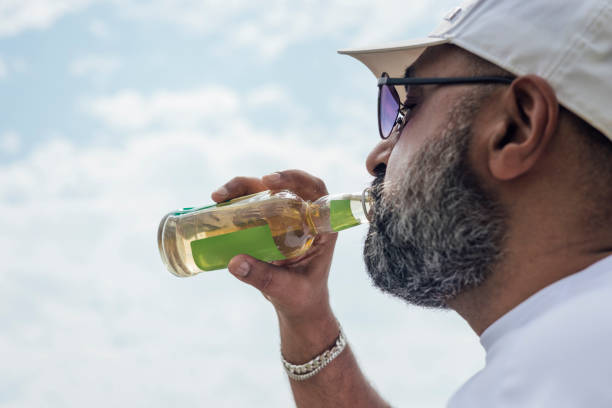 istock Enjoying a Cold Drink on a Hot Day 1646446700