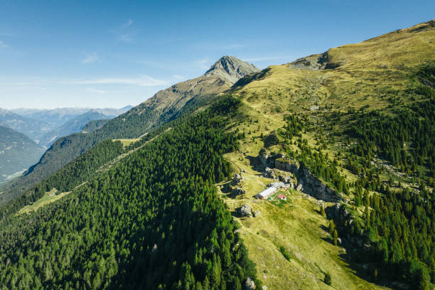 istock Swiss village and mountain ranges 1646458593