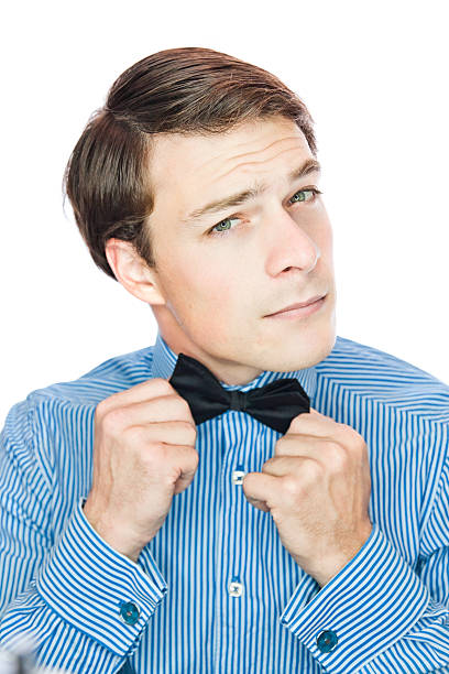 istock Handsome old-fashioned gentleman adjusting his bow tie 164646078