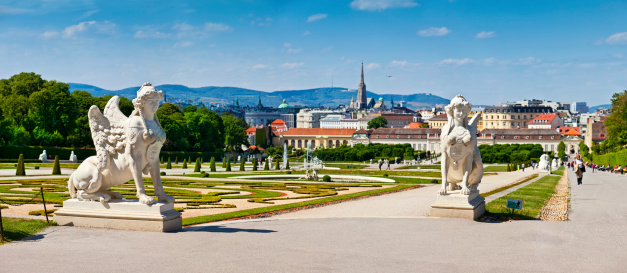 View on the city from the Upper Belvedere Palace with the historic garden in front. In the back the St. Stephen's Cathedral (German: Stephansdom) and the Viennese mountains Kahlenberg and Leopoldsberg. Focus on foreground