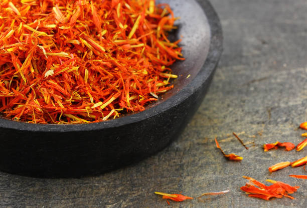 istock fresh organic spices saffron on wooden table 1646464920