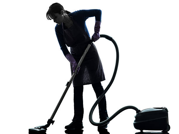 woman maid housework Vacuum Cleaner silhouette one caucasian woman maid Vacuum Cleaner cleaning  in silhouette studio on white background custodian silhouette stock pictures, royalty-free photos & images