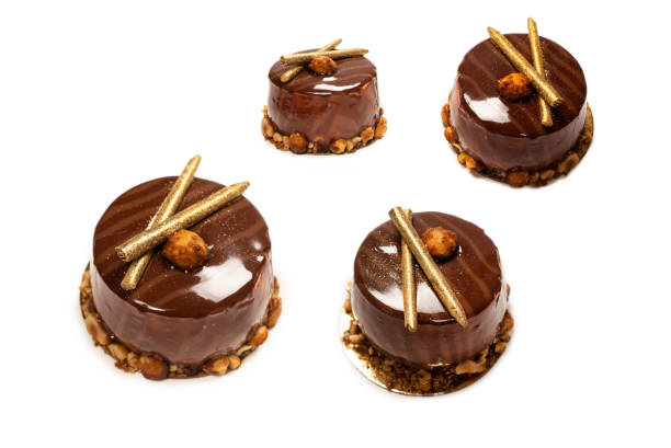 istock Chocolate and caramel cake isolated on a white background. 1646491779