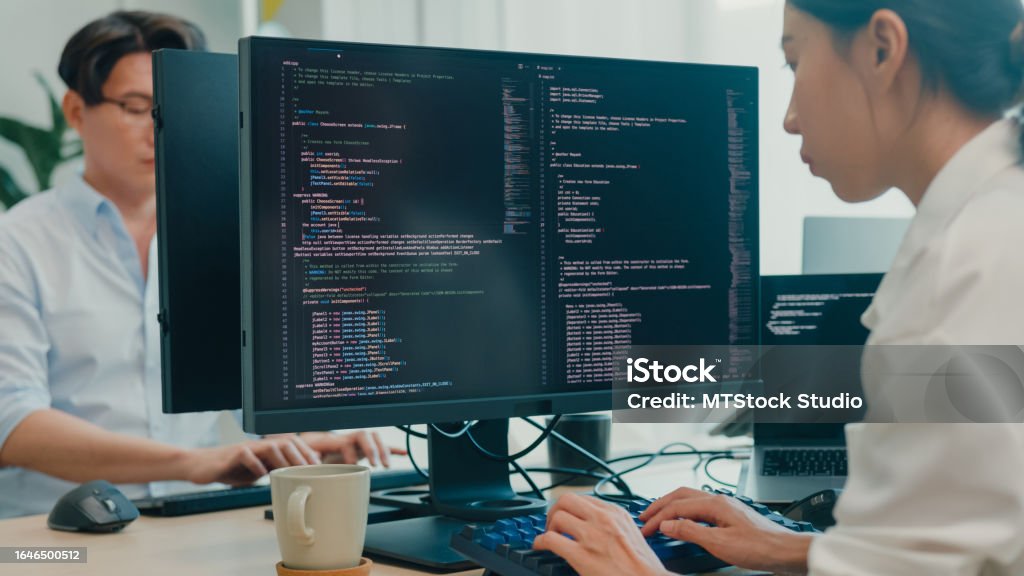 Personal Computing Software Writer Group Of Asian People Software Developers Using Computer To Write Code ...