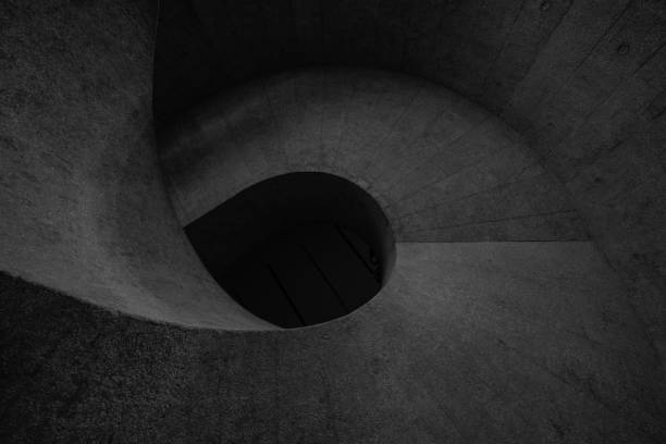 The low angle inside the undecorated concrete building
