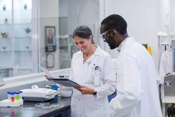 istock Two diverse colleagues review experiment results 1646509081