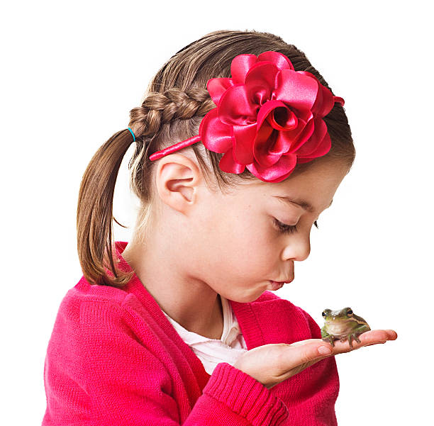 istock Little Princess kissing a frog 164651485