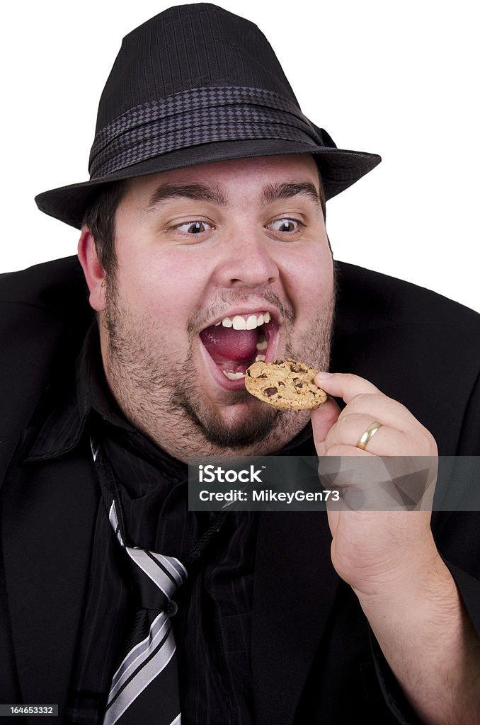 Homem comendo biscoitos - Foto de stock de Adulto royalty-free