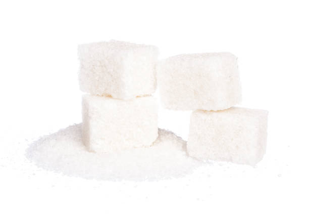 istock Cubes of sugar isolated on white background 1646541227