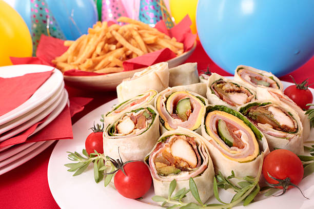 avvolgere panini per parti cibo - tray sandwich wrap sandwich party foto e immagini stock