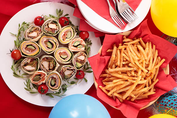 avvolgere panini per parti cibo - tray sandwich wrap sandwich party foto e immagini stock