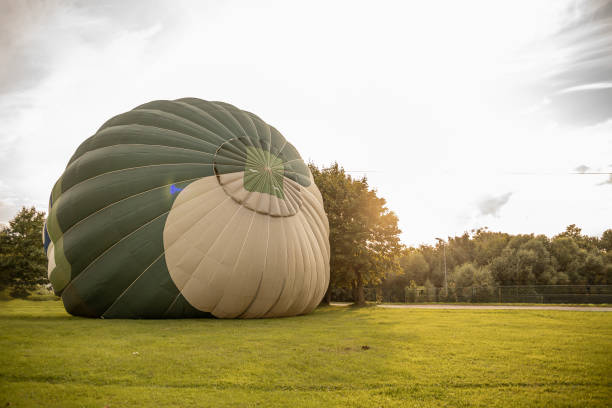 istock Hot air balloon on the ground 1646571111
