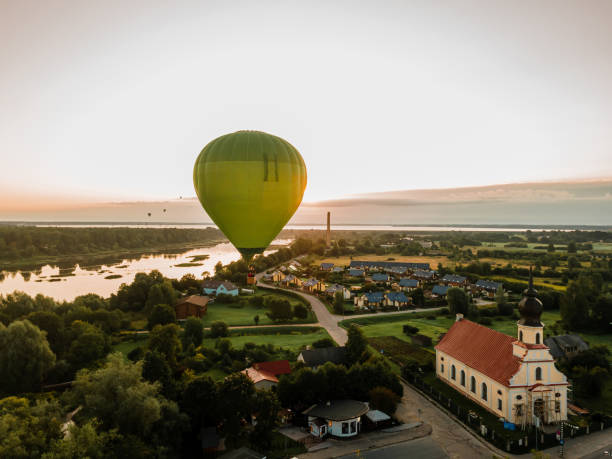 Air balloon in the evening sky, aerial drone view