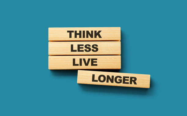 istock Wooden blocks think less live longer word 3d illustration 1646573127