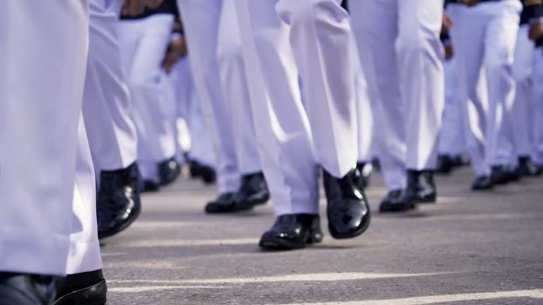 Close up  young soldier roll orderly marching in formal suit go to celebrate in Army  day.