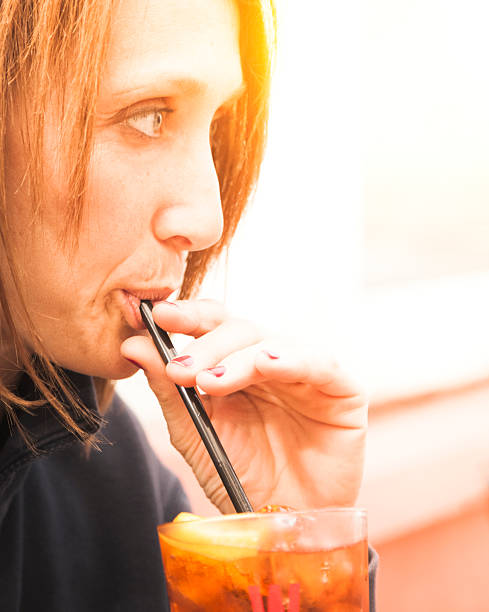 istock Adult Woman Drinks Aperitif 164658036