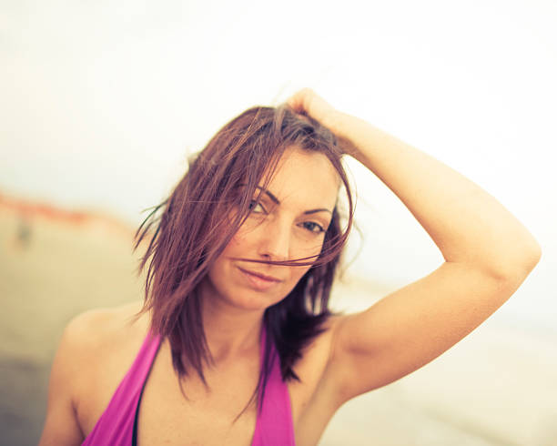 istock Beautiful Woman on The Beach 164658102