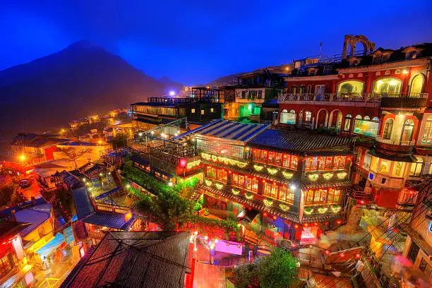 Jiufen, Taiwan hillside with old teahouses at dusk.