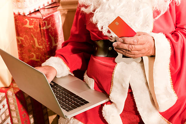 OnLine Shopping for Santa Claus stock photo