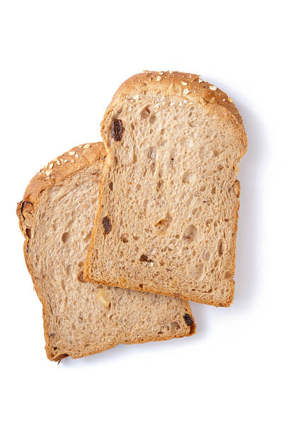 istock Sliced whole wheat bread with raisin and walnut 164661737