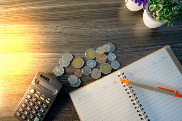 istock Calculation tools, notebooks, and business and financial planning. 1646620599