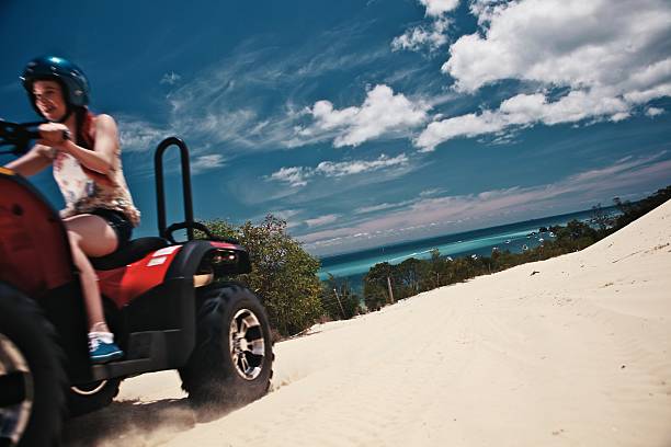 istock Girl Quad Biking on Tropical Island 164662397