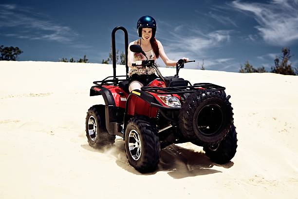 istock Girl Quad Biking on Tropical Island 164662402