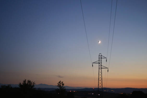 istock A transmission tower on the background of the Moon 1646668364