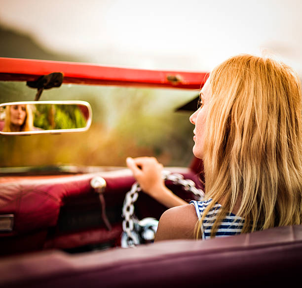 istock Blond woman in convertible 164667474