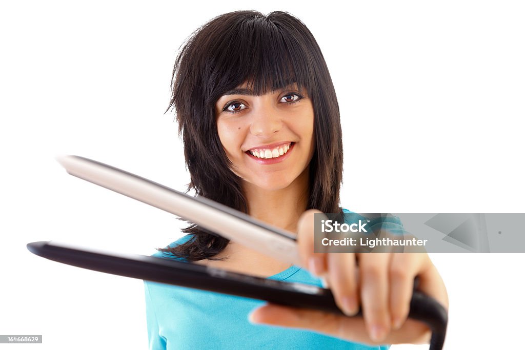 Haare glätten, bevor Sie nach - Lizenzfrei Frauen Stock-Foto