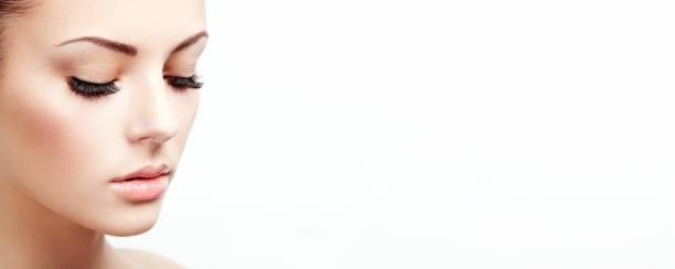 istock Beautiful woman with long false eyelashes 1646692842