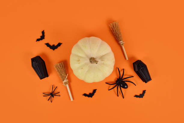 istock Halloween arrangement  on orange background 1646700671