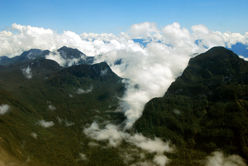 aereal point of view of the jungle and mountains in Papúa (Indonesia)