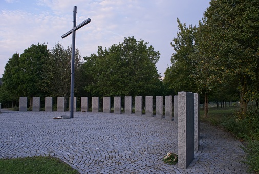 Budaors, Hungary - Aug 18, 2023: German Second World War cemetery in Budaors. This war cemetery contains 14,000 German and 600 Hungarian war graves. Summer sunny day. Selective focus