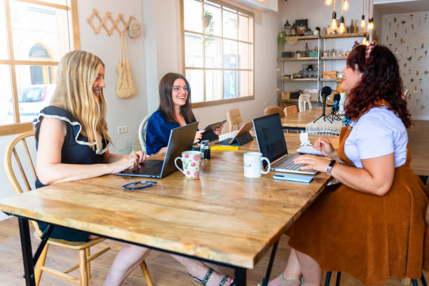 istock Female coworkers in a modern office 1646768384