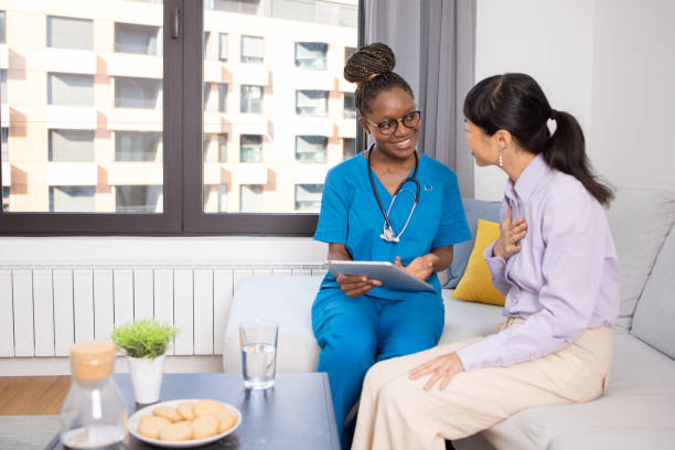 istock Nurse explains the medication to the patient 1646791126