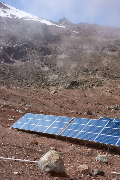 istock Solar panels with Chimborazo volcano in background. 1646837065