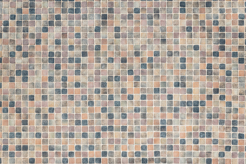 Old gray brown mosaic tiles.