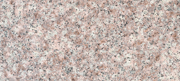 Stone texture of natural multicolor granite.