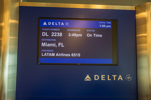 USA. Miami Beach. 08.29.2023. Close-up view of information display of Delta airlines at airport gate.