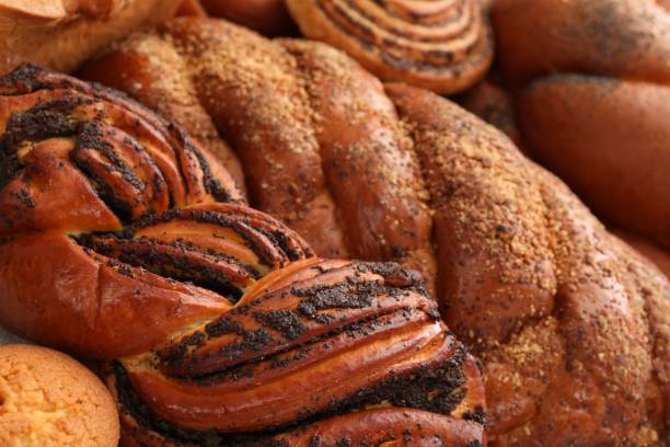 istock Different tasty freshly baked pastries as background, closeup 1646846206