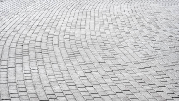 istock Gray paving stones on the sidewalk, background. 1646846449