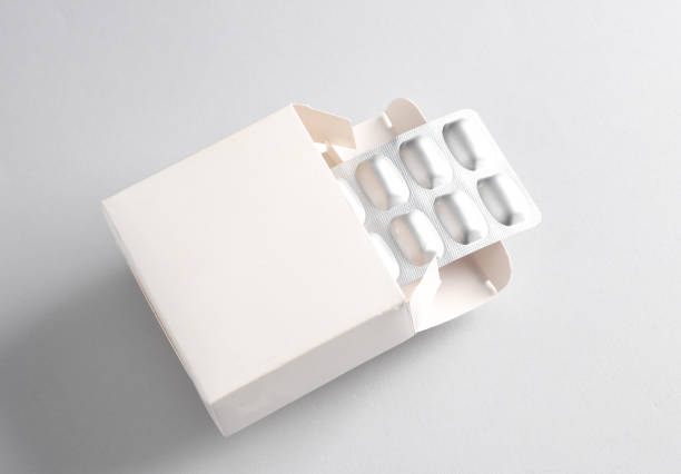 istock White box mockup with blister pills on gray background. Template for design 1646846913