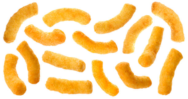 istock Many tasty corn sticks falling on white background 1646862660