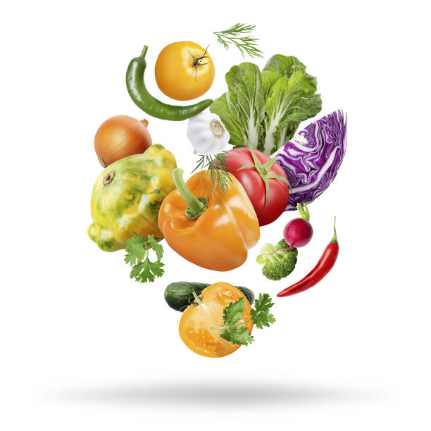 istock Many fresh vegetables and herbs falling on white background 1646863189