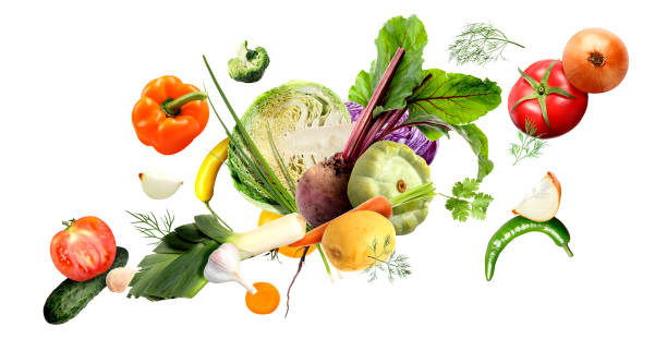 istock Many fresh vegetables and herbs falling on white background 1646863197