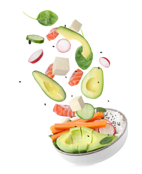 istock Poke recipe. Different ingredients falling into bowl on white background 1646863210