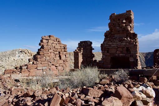 abandoned fallen building in Arizona, a couple of walls partially standing