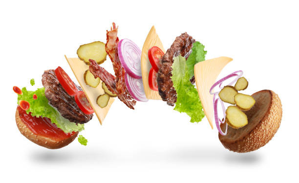 istock Delicious burger with different flying ingredients on white background 1646873918